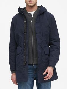 Winter Travel Outerwear With Storm Flap, Waterproof Cotton Outerwear, Functional Cotton Outerwear For Cold Weather, Waterproof Cotton Casual Outerwear, Casual Waterproof Cotton Outerwear, Cotton Windbreaker With Double-lined Hood For Cold Weather, Long Cotton Parka With Pockets, Cotton Long Coat Parka With Pockets, Weatherproof Cotton Parka For Outdoor