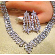 This Breathtaking Necklace And Earring Set Will Add Red Carpet Glamor To Your Wedding Ensemble. This Lavish Jewelry Set Is For The Bride Who Loves Attention Getting, Head-Turning Bling In A Luxury Design! You Want A Stone That Looks, Feels, And Acts Like A Diamond But Is Also Affordable, Eco-Friendly, And Conflict-Free. You’re Not Alone. And, We’re Willing To Bet That Cubic Zircon Is Probably The First Diamond Alternative Popped Into Your Mind. But, Is Cubic Zircon Your Best Option? Thank You Formal Jewelry Sets With Cubic Zirconia Jewels, Cubic Zirconia Jewels Jewelry Sets For Celebration, Cubic Zirconia Jeweled Jewelry Sets For Celebration, Cubic Zirconia Jewelry Sets For Celebration, Glamorous Hand Set Jewelry For Celebrations, Wedding Costume Jewelry Teardrop, Exquisite Diamond-accented Jewelry For Party, Exquisite Diamond Accented Jewelry For Parties, Formal Jewelry With Jewels And Cubic Zirconia