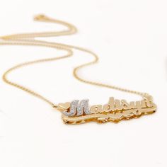 "Personalized gold and diamond 3D name necklace 1.50\" wide made of solid 14k Yellow gold and first letter in Diamonds. The necklace suspends from a Cuban Link chain with 4 choices of length: 14\",16\", 18\" and 20\". The necklace can be made with the name of your choice up to 9 letters. A Great gift for Christmas Valentines, Birthday, Anniversary or any other occasion. Contact us for pricing if your name has more than 9 letters. Please use the note section available at checkout to let us know t Gold Nameplate Necklace In Fine Jewelry Style, Fine Gold Nameplate Necklace, Diamond Nameplate Necklaces, Gold Plated Nameplate Necklace For Anniversary, Yellow Gold Custom Nameplate Necklace For Anniversary, Custom Yellow Gold Nameplate Necklace For Anniversary, Custom Silver Nameplate Necklace In Gold Plated, Custom Silver Gold Plated Nameplate Necklace, Luxury Gold Custom Name Necklace