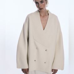 Purchased Last Year. Never Worn. New, No Tags. 94% Wool. Not Itchy. Super Warm And Cozy. Goes Well With Everything. Size Medium. Oversize Fit. Cozy Oversized V-neck Outerwear, Chic Long Sleeve Neutral Cardigan, Chic Neutral Long Sleeve Cardigan, Fall Workwear Winter White Cardigan, Oversized V-neck Outerwear For Spring, White V-neck Outerwear For Layering, Oversized Beige Shawl Collar Outerwear, Chic Cream Winter Cardigan, Chic Cream Cardigan For Winter