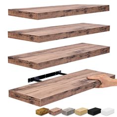 three wooden shelves are shown with different colors and sizes, one being held up by a person's hand