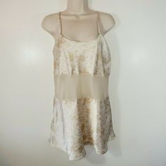 Frederique Womans Small Slip Camisole Cream Floral Nwt. Condition Is New With Tags. 100% Polyester Measurements Armpit To Armpit 17.5" Nape To Hem 19.5" Cream Camisole Sleepwear For Spring, Cream Sleeveless Sheer Sleepwear, Beige Camisole Sleepwear For Spring, Beige Camisole Sleepwear For Summer, Summer Beige Camisole Sleepwear, Sheer Sleeveless Camisole For Sleep, Elegant Beige Sleeveless Sleepwear, Elegant Sleeveless Beige Sleepwear, Fitted Feminine Beige Sleepwear