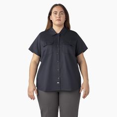 The Dickies Women’s Plus 574 Original Work Shirt offers a traditional workwear uniform style with a modern fit. It features our classic 574 style, perfect for the workplace. The shirt has a durable and comfortable cotton and polyester blend, moisture-wicking technology, and an easy-care stain release finish. The classic work shirt detailing, front darts for optimal fit, and a back yoke for mobility will last for years. The dual front patch pockets have a button closure and are great for workplac Workwear Shirt With Welt Pockets, Relaxed Fit Button-up Short Sleeve Work Shirt, Relaxed Fit Button-up Short Sleeve Shirt For Work, Classic Button-up Short Sleeve Work Shirt, Classic Short Sleeve Shirt With Button Closure For Work, Solid Collared Short Sleeve Shirt For Work, Workwear Short Sleeve Shirt With Button Closure, Short Sleeve Shirt With Button Closure For Work, Professional Cotton Tops For Workwear