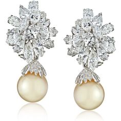 Immerse yourself in the breathtaking beauty and timeless elegance of our Platinum 26-carat Diamond Cluster and Pearl Drop Earrings. Every aspect of this masterpiece is crafted with the utmost care and precision, showcasing the perfect fusion of luxurious elements.Picture yourself adorned with these exquisite earrings, featuring two meticulously matched creamy South Sea pearls, each measuring a radiant 0.5 inches. The pearlescent allure is further enhanced by a resplendent cluster of brilliant-cu Yellow Jewelry, Diamond Birthstone, Drop Design, Pearl Design, Sea Pearl, Breathtaking Beauty, South Sea Pearls, Sea Pearls, Women Diamond