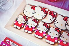 hello kitty cookies are displayed on a table