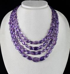 PRODUCT DETAILS LINE 4 /CTS 662 NATURAL AMETHYST LONG TUMBLE BEADS ULTIMATE RARE SIZE NATURAL BEADS SIZES OF THE BEADS ARE FROM 22 MM TO 6 MM LENGTH OF THE NECKLACE IS 15 INCHES OUTER LENGTH OF THE NECKLACE IS 19 INCHES GRAB IT NOW!! FINE PURPLE COLOR BEST LOWEST PRICE OFFERED NOTE - #You will receive the same product you see in picture. #DEAR BUYERS PLEASE FEEL FREE TO ASK QUESTIONS #WE WILL BE GLAD TO ANSWER & SOLVE QUERY REGARDING THIS PRODUCTS #RETURN POLICY Every piece of jewellery and inpu Luxury Amethyst Gemstone Beads, Purple Beads Necklace Indian, Beads Necklace Designs Indian, Purple Beads Necklace, Amethyst Jewellery, Purple Bead Necklace, Beaded Fashion, Beaded Necklace Designs, Pearl Jewelry Sets