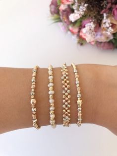 Elegant Gold Friendship Bracelets With Spacer Beads, Rose Gold Jubilee Beaded Bracelet As Gift, Rose Gold Hand-strung Bracelets, Rose Gold Stackable Beaded Bangle Bracelets, Rose Gold Beaded Bangle Bracelets, Rose Gold Beaded Bracelets For Gifts, Rose Gold Beaded Bracelet For Gift, Beaded Rose Gold Bracelets As Gift, Dainty Rose Gold Bangle Beaded Bracelet