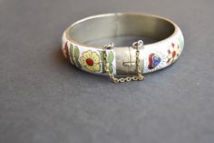 vintage enamel bracelet thailand Collectible Enamel Bracelet Jewelry, Antique Enamel Bracelet Collectible, Bohemian Enamel Bangle Bracelets, White Enamel Bohemian Jewelry, Bohemian Enamel Bangle Bracelet, White Bohemian Enamel Jewelry, Hand Painted Gold Bracelet, Handmade Vintage Style Enamel Ring, Vintage Multicolor Enamel Bangle