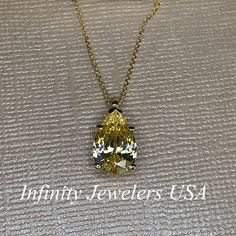 "The pendant pictured is canary yellow simulated diamond #7060 -Approximate total carat weight: approx. 3.60ctw diamond equivalent -Center Stone Size: 12x8mm - approx. 3.60ct diamond equivalent -Center Stone Shape: pear / tear drop -Gem Type: simulated diamond -Stone Clarity: VVS1 -Stone Color: Canary Yellow -Moh's Scale: 8.5 hardness -Metal Type and Purity: 14k yellow gold -Setting: 5 prong basket head -Size: Height with bail approx 15.30mm x Width approx. 8mm -Chain: delicate 14k gold chain / Pear-shaped Cubic Zirconia Jewelry, Gia Certified Cubic Zirconia Pear-shaped Jewelry, Gia Certified Yellow Gold Teardrop Jewelry, Fine Jewelry Yellow Teardrop Necklace, Yellow Teardrop Fine Jewelry Necklace, Yellow Pear-shaped Gemstone Jewelry, Yellow Teardrop Pendant Jewelry For Anniversary, Gia Certified Fine Yellow Jewelry, Gia Certified Yellow Fine Jewelry