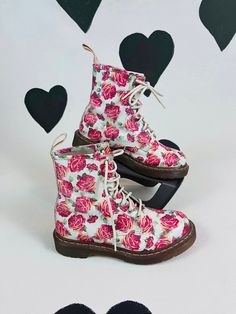 This is a super rare pair of vintage Dr. Martens valentine rose boots.  They are in very lovely vintage condition. Minimal wear, lots of life left.  They are a US size 7, UK 5, EU 38 Retro Lace-up Spring Boots, Retro Lace-up Boots For Spring, Vintage High-top Boots For Spring, Vintage Lace-up Boots For Spring, Vintage Spring Boots With Round Toe, Vintage Round Toe Boots For Spring, Vintage Ankle Lace-up Boots For Spring, Vintage Lace-up Ankle Boots For Spring, Vintage White Boots For Spring