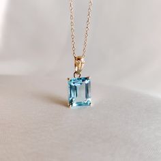 This stunning pendant is set in 14K Solid Yellow Gold studded with Sky Blue Hydro in classic prong setting. It is an unique gemstone pendant for nearly every occasion and is completely hassle-free jewelry. ◾ITEM DETAILS * Gem:  Sky Blue Hydro * Gem Size: 8X10mm * Gem Shape: Octagon cut * Gem Weight: 3.85 carats * Gold Purity: 14KT  * Gold Weight: 0.60 gram * Total Weight of the Pendant: 1.37 gram The Gold purity is guaranteed and it comes with authentic 14KT gold hallmark. Since my items are han Gold Skies, Handmade Jewelry Box, Unique Gemstones, Valentine Gift, Gold Studs, 14kt Gold, Solid Yellow, Free Jewelry, Gemstone Pendant