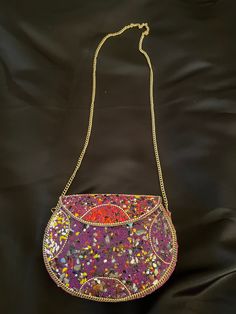 Handmade Evening Bag from Tibet . Each one is one of a kind! Bohemian Crossbody Shoulder Bag For Party, Unique Evening Clutch Bag, Unique Handmade Evening Bags, Unique Rectangular Party Bags, Handmade Purple Handheld Shoulder Bag, Handmade Purple Evening Bag, Multicolor Clutch With Adjustable Strap For Gift, Handmade Handheld Purple Shoulder Bag, Unique Handmade Party Bag