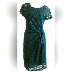 Glitter And Sparkle For Lace Wrap Tie Look Dress ! Cute Cute Cute! Just At The Knee Beautiful Evening Dress With Glitter And Cute Tied Look Side Bow Size L New With Tags! Great Holiday Dress! Green Short Sleeve Lace Dress For Party, Fitted Sparkling Green Dress, Elegant Shimmer Dresses For Festive Occasions, Green Glitter Dress For Night Out, Fitted Green Glitter Dress, Green Fitted Dress With Glitter Details, Green Glitter Fitted Dress, Elegant Green Lace Dress For Party, Green Shimmer Party Dress