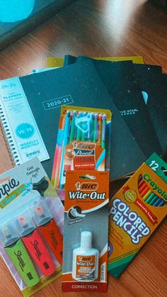 various school supplies are sitting on a table