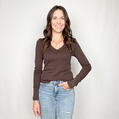 This is an easy long sleeve v-neck tee that's a great basic to add to you wardrobe. Wear it alone or for layering under all your jackets & sweaters. V-neck Long sleeves Fitted 100% Cotton Care instructions: Machine wash cold, tumble dry low Made in USA Item # 88001 Shapewear Swimsuit, Jackets Sweaters, Boho Soul, Easy Like Sunday Morning, Loafer Mules, Sneaker Heels, Swimsuit Cover, Boots Outfit, Sweater Coats