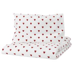 two sheets with red hearts on them