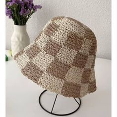 Slay in style with the Checkered Chic Bucket Hat! This trendy straw hat is perfect for any outfit and features an adjustable strap for a perfect fit. Whether you want to rock a cute, chic look or add a touch of playfulness, this bucket hat is a must-have accessory. Trendy Adjustable Bucket Hat For Beach Season, Trendy Sun Hat For Day Out, Trendy Adjustable Bucket Hat For Vacation, Trendy Summer Sun Hat, Trendy Woven Hats For Vacation, Casual Adjustable Crochet Hat With Woven Details, Casual Adjustable Woven Crochet Hat, Trendy Adjustable Sun Hat With Short Brim, Trendy Woven Sun Hat For Vacation