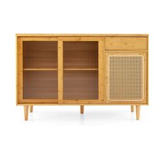 a wooden cabinet with wicker doors and drawers