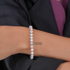 Lab Grown Diamond Bracelet, Round Diamond Four Prong Set Bracelet in 14KWhite Gold, Diamond Tennis Bracelet *Stone: Lab Grown Diamond *Metal:  14k Solid Gold *Net Gold - 14.49 *       No. Of Diamond - 42 *       Diamond Size - 3.70MM *       Bracelet Length - 6.5 Inches *Carat - 7.65 *Diamond color: White *      Silver weight: 14.49 *      Diamond Weight: 7.65 *Handmade item Metal Finishing Available: 14k Solid Yellow Gold, 14k Sold Rose Gold and 14K Solid White Gold    *Gift wrapping available Classic Round Diamond Heart Bracelet, Classic Diamond Heart Bracelet, Classic Diamond Heart Bracelet In White Gold, Classic White Gold Diamond Heart Bracelet, Elegant Cubic Zirconia Heart Bracelet With Jubilee Band, Elegant Heart Bracelet With Diamond Accents For Formal Occasions, White Gold Diamond Heart Bracelet, Cubic Zirconia Chain Bracelet With Prong Setting For Anniversary, Anniversary Chain Bracelet With Cubic Zirconia