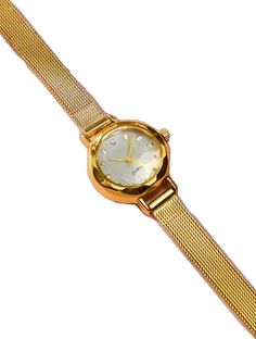 Chic Everyday Gold Watches, Chic Gold Everyday Watch, Minimalist Gold Watch With Bracelet Strap, Gold Minimalist Watch With Bracelet Strap, Minimalist Adjustable Gold Watches, Minimalist Gold Watch With Adjustable Fit, Chic Gold Watch With Metal Dial, Minimalist Gold Watch With Metal Dial, Gold Minimalist Watch With Metal Dial