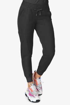 Our Ava Therese Smile Face 6-Pocket Jogger Pants may be the most fun joggers ever! With these wonderful colors and smile face waistband you will stand out from the crowd. Plus talk about functional, plenty of pockets and rib-knit details complete the awesomeness. Zavate Ava Therese is made for the toughest work days in Synergy 4-way stretch. Complete with moisture wicking tech, our styles don t stop with modern looks, they re functional and high-performing. • Modern fit • Mid-rise • Smile face e Stretch Bottoms With Tapered Leg And Functional Pockets, Stretch Bottoms With Functional Pockets And Tapered Leg, Mid-rise Stretch Pants With Cargo Pockets, Stretch Full-length Bottoms With Side Pockets, Straight Leg Joggers With Pockets For Workwear, Sports Bottoms With 5-inch Inseam And Pockets, Tapered Leg Workwear Joggers With Pockets, Stretch Full Length Pants With Side Pockets, Athleisure Bottoms With Pockets For Work