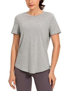 PRICES MAY VARY. Designed for low-impact workouts or daily wear. Super soft, skin-friendly and lightweight fabric keeps you comfortable. Classic fit, hip length. Classic round neck design, seamless double needle collar for comfortable fit. Basic short-sleeved shirt with a moderate length curved hem, easy to pair with any trouser. Pima Cotton collection is super soft and feels great against your skin, aiming to offer a comfortable feeling to you. Classic round neck design with long curved hem, lo Crz Yoga, Round Neck Design, Basic Shorts, Tops Fall, Womens Activewear, Yoga Women, Pima Cotton, Cotton Shorts, Neck Designs