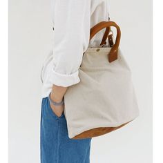 Overview： Design: White Canvas Tote Bag Canvas Handbag Womens Canvas Shoulder Tote Bag for MenIn Stock: Ready to Ship (2-4 days)Include: Only BagCustom: NoColor: WhiteLeather: CanvasMeasures: 38.5cm x 31cm x 16cm Weight: 0.45kgSlots: 1 main slotAccessories(option): NoneStyle: White Canvas Tote Bag Canvas Handbag Womens Canvas Shoulder Tote Bag for MenVery durable (At least 5 Years) and it should last a life time Description: The White Gray Canvas Tote Bag, measuring 38.5cm x 31cm x 16cm, is a ve Beige Travel Bag With Handles For Everyday Use, Beige Canvas Bag With Leather Handles For On-the-go, Beige Satchel Duffle Bag For Daily Use, Beige Satchel Travel Bag With Handles, Beige Travel Bag For Everyday Use, Bucket Canvas Bag With Adjustable Strap For Travel, Versatile Canvas Travel Bag With Handles, Travel Canvas Bag With Adjustable Strap, Bucket Shape, On-the-go Satchel Bag With Leather Trim