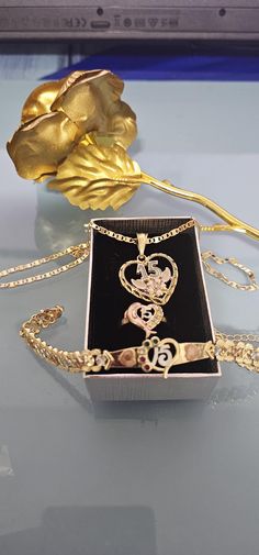 Special for you. We offer free shipping with the purchase of 35 dollars or more! with First Class Mail (Not Priority Mail) 14k Tricolor Gold Plated "Mis Quince" Set (Bracelet, Ring & Necklace)  ~ Set (Cadena, Anillo, Brazalete) para 15 Años Oro Laminado - "Mis XV", Perfect for "Mis XV" Special Gift! Exclusive  Set (Bracelet, Ring & Necklace) For your Birthday! en Chapa de Oro de 14K - Material: Copper Pendant: 1.5 " H , 1" W Chain - 18", 20", 22" and 24" inches Very Important Size Bracelet :  8 inches  + extension (please check the size of your bracelet, this one measures 8 inches.) Example Measurements: Chain - 12 inch. from top to bottom (24" Long from end to end) "The girl who is fifteen years old," which basically means the birthday girl, but the actual event is also called Quinceañera Quince Arrangement, Quinceanera Gifts For Her, Quince Necklace, Quinceanera Rings, Charro Quinceanera Theme, Royal Blue Quinceanera Theme, Quince Gifts, Blue Quinceanera Theme, Quince Jewelry