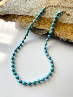 Beautiful Turquoise Knotted necklace. -6mm Turquoise beads. -Gold plated findings. Turquoise Single Strand Necklace In Amazonite, Turquoise Amazonite Single Strand Necklace, Spiritual Single Strand Turquoise Beaded Necklace, Artisan Blue Amazonite Necklaces, Howlite Gemstone Beads Necklace, Handmade Turquoise Beaded Necklaces With Round Beads, Turquoise Single Strand Beaded Bohemian Necklace, Turquoise Single Strand Amazonite Beaded Necklace, Hand-strung Turquoise Amazonite Beaded Necklaces