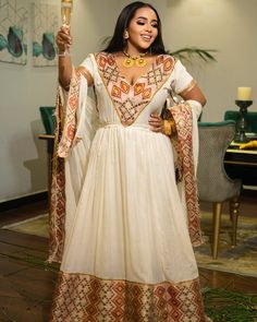 Majestic Diamond-Shaped Embroidered Habesha Dress Elegant White Anarkali Set With Embroidered Border, Anarkali Floor-length Dress With Embroidered Neckline, Floor-length Dresses With Embroidered Neckline For Festive Occasions, Festive Floor-length Dresses With Embroidered Neckline, Anarkali Wedding Sets With Embroidered Neckline, Festive Anarkali Dupatta With Embroidered Neckline, Festive Wedding Dupatta With Embroidered Neckline, Festive Embroidered Neckline Wedding Dupatta, Anarkali Dresses With Embroidered Neckline For Festive