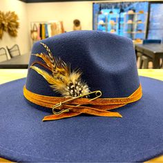 Beautiful Hat I Decorated. Very Unique. Blue Felt Hat With Flat Brim For Spring, Blue Flat Brim Felt Hat For Spring, Blue Wide Brim Fedora For Kentucky Derby, Blue Flat Brim Felt Hat For Kentucky Derby, Blue Brimmed Felt Hat For Kentucky Derby, Blue Short Brim Felt Hat For Fall, Blue Adjustable Fedora For Kentucky Derby, Blue Fedora With Short Brim For Fall, Blue Adjustable Felt Hat With Short Brim