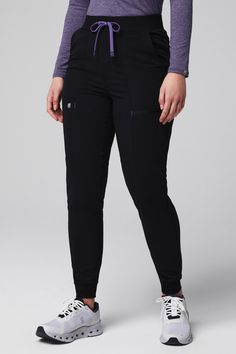 High-Rise On-Call Scrub Jogger Fabletics Black/Wisteria female Activewear >> Scrubs >> Bottoms >> Product Feed MotionTech regular 4-Way Stretch/Breathable/Lightweight Feel Black Scrubs Outfit, Black Jogger Scrubs Outfit, Black Scrubs Aesthetic Girl, Scrubs Uniform Cute Black, Cute Figs Scrubs, Black Wisteria, Scrubs Uniform Black, Deep Autumn Palette, Stylish Scrubs