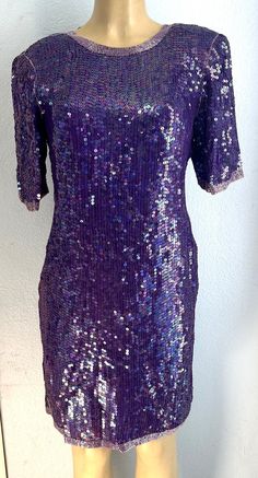 This is a very beautiful white dress with sequins, hand beaded to perfection with sequins shape all around. This is for sure an elegant dress for special events, weddings, parties, anniversaries, romantic dinners, red carpets, etc. Glamorous Purple Sequin Dress For Party Season, Elegant Shimmer Evening Dress For Party Season, Fitted Shimmer Dress For Festive Season, Formal Sequin Dress For Party Season, Fitted Sequin Dress For Formal Party Season, Elegant Shimmer Dress For Party Season, Formal Fitted Sequin Dress For Party Season, Festive Glitter Party Dress, Summer Evening Sequin Dress With Shimmer