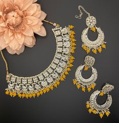 This faux kundan necklace is a simple and lightweight wear. The necklace comes with matching earrings and tikka. It is perfect for bridesmaids or gifting and to wear for mehendi or haldi events! Cheap White Kundan Necklace For Celebration, Eid Gift Kundan Necklaces, Kundan Meenakari Necklace For Eid Gift, Eid Gift Multicolor Kundan Necklace, Kundan Meenakari Bridal Necklace For Eid, Ceremonial Kundan Meenakari Necklace For Eid, Bollywood Jewelry, Kundan Necklaces, Kundan Jewellery