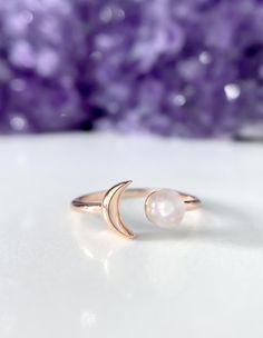 Sun and Moon Ring | Channel the power of the moon with this authentic moonstone ring. Handcrafted in 14K rose gold over sterling silver. It features an open shank sun & moon ring design and will be a wonderful addition to your ring collection. A luminous rainbow moonstone symbolizes inner growth and strength. Wear it to promote inspiration, intuition and empathy. Silver Moonstone Ring With Sun And Moon Design, Gold Crystal Moon-shaped Ring, Adjustable Moon-shaped Elegant Crystal Ring, Spiritual Gold Moon-shaped Ring, Handmade Moon-shaped Spiritual Crystal Ring, Sun And Moon Rings, Promise Ring Set, Moonstone Crystal, Moon Ring