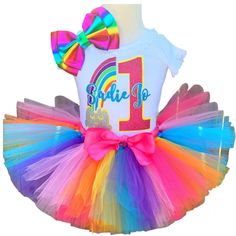 "\"This Rainbow Kids Birthday Outfit Set is Customizable for your baby! The material is high quality, soft and comfy. Sparkles and Glitter are professionally applied and do not shed. This listing is for one Birthday Shirt or Bodysuit with Sparkle Shorts and A Handmade Hair Bow available for Add-Ons. Please choose your options in the drop down menu.  🎂Washing/Care Instructions: Turn inside out and machine wash cold, tumble dry low heat, do not iron directly onto design. 👉Check out these other m Unique Kids Clothes, Kid Birthday Outfits, 1st Birthday Hats, Bow Birthday, Tutu Birthday, Sparkle Shorts, Unique Baby Clothes, Rainbow Tutu, First Birthday Shirts