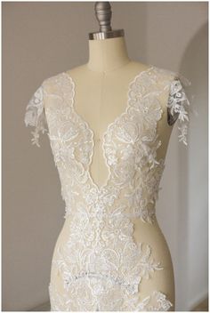 Beautiful Off-white sequin flower lace trim for exclusive and luxury wedding dresses  ❀❀ SAMPLE SWATCHES❀❀ If you want to check the color and quality, you can order a swatch here (READ DESCRIPTION OF THE LISTING  https://www.etsy.com/listing/733242442/sample-swatch-please-read-description?ga_search_query=sample&ref=shop_items_search_1&crt=1 Please note, that it can happen, that till you get your lace sample with air mail, the lace could be sold in this time.   Perfect for dress making, bridal we Fitted Lace Wedding Dress With Lace Bodice, White Fitted Lace Wedding Dress, Fitted Lace Wedding Dress With Delicate Details, White Fitted Wedding Dress With Delicate Lace, Fitted Wedding Lace With Lace Back, Fitted Lace Back Dress For Weddings, Fitted Cream Lace With Lace Patchwork, Fitted Cream Lace With Patchwork Detail, White Lace Wedding Dress With Lace Patchwork