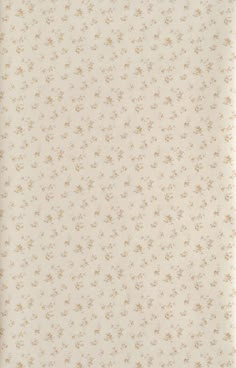 a white and gold wallpaper with small flowers on it