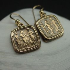 Handmade reproduction of intaglio earrings representing this great Odyssey scene of Odysseus (Ulysses in Latin) returning to his queen Penelope.The cameo represents Queen of Ithaca, Penelope, being led in secret by her lady in waiting to her husband, Odysseus, who went missing during the Trojan War.The Odyssey is a Greek epic poem traditionally attributed to Homer, describing the travels of Odysseus during his ten years of wandering after the fall of Troy. He eventually returned home to Ithaca a Odysseus And Penelope, His Queen, Tarpon Springs, Lady In Waiting, After The Fall, The Odyssey, Antique Earrings, Ancient Rome, Greek Mythology