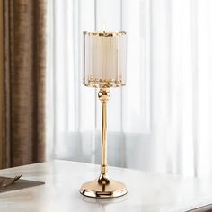 a table with a lamp on top of it