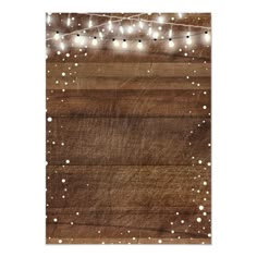 a wooden background with lights and snow flakes