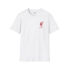 Support the Reds in style with this classic Liverpool FC t-shirt! This comfy tee features the iconic Liverpool FC logo, perfect for any die-hard fan.  Whether you're cheering them on at Anfield or watching from afar, show your unwavering loyalty to the club with this timeless design. Unmatched Comfort, Built to Last: The unisex soft-style t-shirt puts a new spin on casual comfort.  Made from very soft materials, this tee is 100% cotton for solid colors, ensuring a breathable and lightweight feel. Heather colors and sports grey include polyester for added durability. The shoulders have twill tape for improved durability, and the sides are seamlessly constructed for a smooth look.  The ribbed knit collar prevents curling damage, so you can rep the Reds with confidence. Here's what makes this Crew Neck T-shirt For Fan Events, White Cotton T-shirt For Fan Events, Graphic Print Crew Neck T-shirt For Fans, Crew Neck T-shirt With Screen Print For Fan Events, Graphic Tee T-shirt With Logo For Fan Gear, Graphic Tee With Logo Print For Fan Gear, Graphic Tee Tops For Fan Events With Screen Print, Graphic Tee With Screen Print For Fan Events, Fan Merchandise Logo Print T-shirt