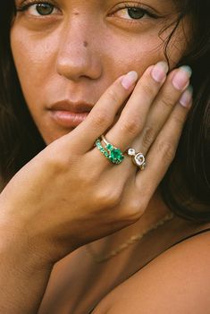 Discover the epitome of elegance with our Triple Stone Emerald Ring, a breathtaking piece crafted in luminous 14K gold. This ring features three exquisite emeralds, each selected for their rich, vibrant green hue and exceptional clarity, arranged in a captivating trilogy that symbolizes enduring love and commitment. The trio of emeralds is elegantly set in a classic setting that showcases their natural brilliance, with the radiant 14K gold band providing a warm, luxurious contrast that enhances Round Stone Ring, Emerald Eternity Band, Round Rings, Sapphire Stone, Emerald Gemstone, Vibrant Green, Eternity Band, Pitcairn Islands, White Sapphire