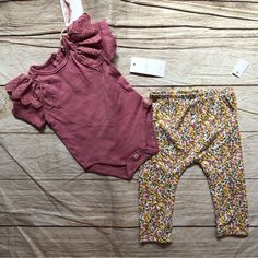 Mauve Pink Onesie With Matching Floral Leggings. Cute Stretch Sets For Spring, Playful Stretch Sets For Spring, Multicolor Playwear Sets For Spring, Playful Matching Sets For Spring, Playful Spring Matching Sets, Pink Matching Set Bottoms For Spring, Stretch Cotton Playwear Sets, Stretch Cotton Sets For Playwear, Cute Purple Spring Sets