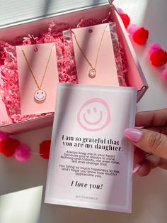 This set of necklaces makes for a perfect gift for your daughter- it's sure to bring a smile to your face and your daughter's too!. It includes two "Happy face" necklaces and comes with a lovely note, as shown in the picture. The necklaces are already packaged in a beautiful pink 5x7 inch box, ready to be gifted. At checkout, you can select the "this is a gift" option if you prefer not to display the invoice. PRODUCT DETAIL Necklace length: 15.5"with 16.5" and 17.5"Extender Gold dipped Hypoaller Inspirational Pink Jewelry For Gift, Inspirational Pink Jewelry For Gifts, Personalized Pink Necklaces For Best Friend Gift, Cute Necklace For Valentine's Day Gift, Cute Necklaces For Valentine's Day Gift, Mother's Day Birthday Gift Wrapped Necklace, Gift-wrapped Necklace For Birthday On Mother's Day, Pink Hypoallergenic Necklace For Mother's Day, Cute Adjustable Necklaces For Best Friend Gift