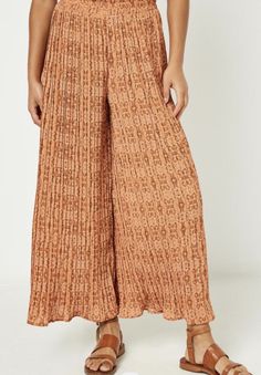 Rust botanical print wide leg pants with smocked waist *true to size 100% polyester hand wash Trendy Pants For Vacation, Floral Print Wide Leg Pants For Day Out, Trendy Full-length Pants For Vacation, Trendy Full Length Pants For Vacation, Vacation Patterned Pants With Elastic Waistband, Patterned Pants With Elastic Waistband For Vacation, Patterned Long Pants For Vacation, Patterned Wide Leg Beach Bottoms, Patterned Floral Print Bottoms For Vacation