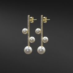 Description: Introducing our exquisite Diamond Bar Pearl Trio Earrings, a harmonious blend of classic design and contemporary elegance. With a sleek bar silhouette adorned with high-quality cubic zirconia diamonds and a trio of lustrous freshwater pearls symmetrically attached along the sides, these earrings exude timeless sophistication. Choose from solid sterling silver or 14k gold-plated sterling silver to effortlessly elevate your look with a touch of refined beauty that captures the essence Modern Cubic Zirconia Linear Earrings For Formal Occasions, Classic Cubic Zirconia Linear Earrings For Party, Classic Linear Earrings With Diamond Accents For Evening, Classic Evening Linear Earrings With Diamond Accents, Chandbalis Earrings, Sleek Bar, Diamond Bar, Tennis Bracelet Diamond, Elevate Your Look