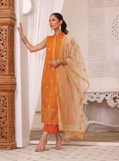 Sleeveless Salwar Kameez Dupatta Pakistani Eid Dress is an epitome of elegance and tradition and it gives you a head-turning appearance on the festive occasion. This perfectly stitched Kameez Trouser is emblazoned with lavish designs and embroideries, making it an epitome of beauty and grace. Kameez: The beautiful kameez in mustard yellow shade comes in premium chiffon fabric and it gives you a lavish look on Eid day. Lavish designs, booti details, and embroidery work make this long kameez an ep Bollywood Style Sleeveless Dress With Cutdana, Bollywood Sleeveless Dress With Cutdana, Sleeveless Sharara With Dupatta For Eid, Sleeveless Cutdana Kurta For Festivals, Sleeveless Kurta With Cutdana For Diwali, Sleeveless Cutdana Salwar Kameez For Festivals, Traditional Sleeveless Anarkali Set With Pallu, Sleeveless Cutdana Kurta For Eid, Designer Sleeveless Raw Silk Kurta