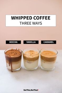 three glasses filled with different types of whipped coffee on top of a white countertop