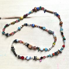 One Of A Kind Handmade Glass Bead Necklace With Vintage Y2k + 90s Beads Featuring: Vintage, Y2k/90s + Modern Beads Glass, Wood, Turquoise, Clay, Few Vinyl/Acrylic Curated Blend Of Small + X-Small Beads Chunk Scale Of 1 To 5: 1.2 Fine Quality Knotted Durable High Tenacity Nylon Cord 14.75” Drop Length 29” Total Length Brand: Www.Karlymortensen.Com Vintage + New Materials Handmade In Denver, Colorado Ready To Ship Featured With Daisy Vs Daisy Earrings - This Listing Is For Necklace Only Shop My Bo Festival Beaded Necklaces With Large Glass Beads, Bohemian Beaded Necklace For Everyday, Bohemian Necklace For Everyday, Bohemian Glass Beaded Necklaces With Wooden Beads, Bohemian Glass Beaded Necklace With Wooden Beads, Artsy Colorful Beaded Necklaces For Festivals, Eclectic Colorful Beaded Necklace For Festival, Spiritual Handmade Beaded Necklace For Everyday, Everyday Handmade Glass Necklaces